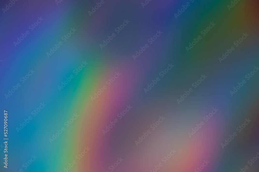 Blur neon glow. Holographic background. Bokeh radiance. Defocused purple pink blue orange color gradient light rays on creative abstract copy space texture. Blur neon glow. Holographic background. Bokeh radiance. Defocused purple pink blue orange color gradient light rays on creative abstract copy space texture.