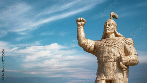 Uzgen, Kyrgyzstan - May 2022: Manas statue in town of Uzgen in Osh Region. Manas is said to be the first khagan of the Kyrgyz Khaganate. photo