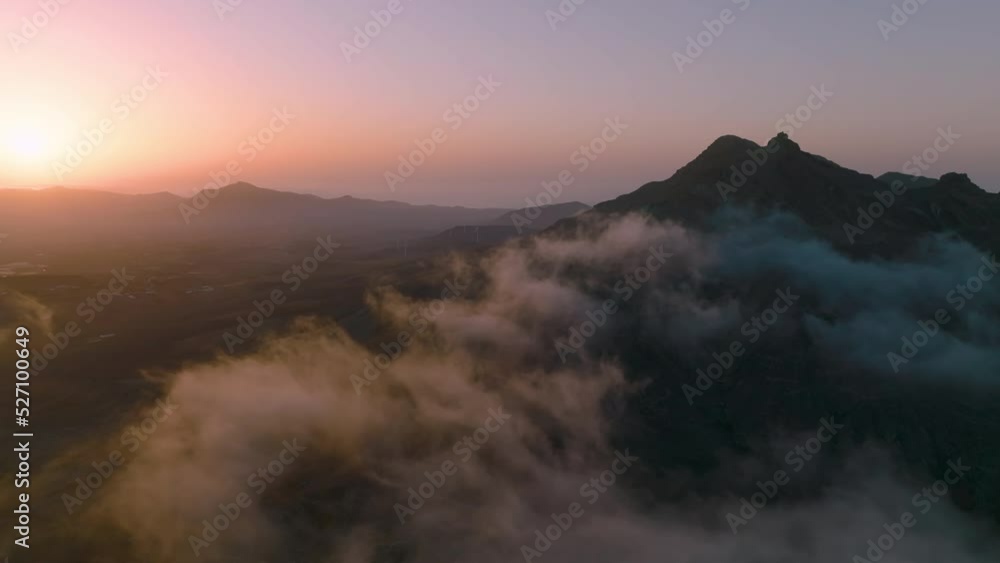 Top view of the sunrise over the mountains. Aerial view of Fuerteventura Top view of the sunrise over the mountains. Aerial view of Fuerteventura