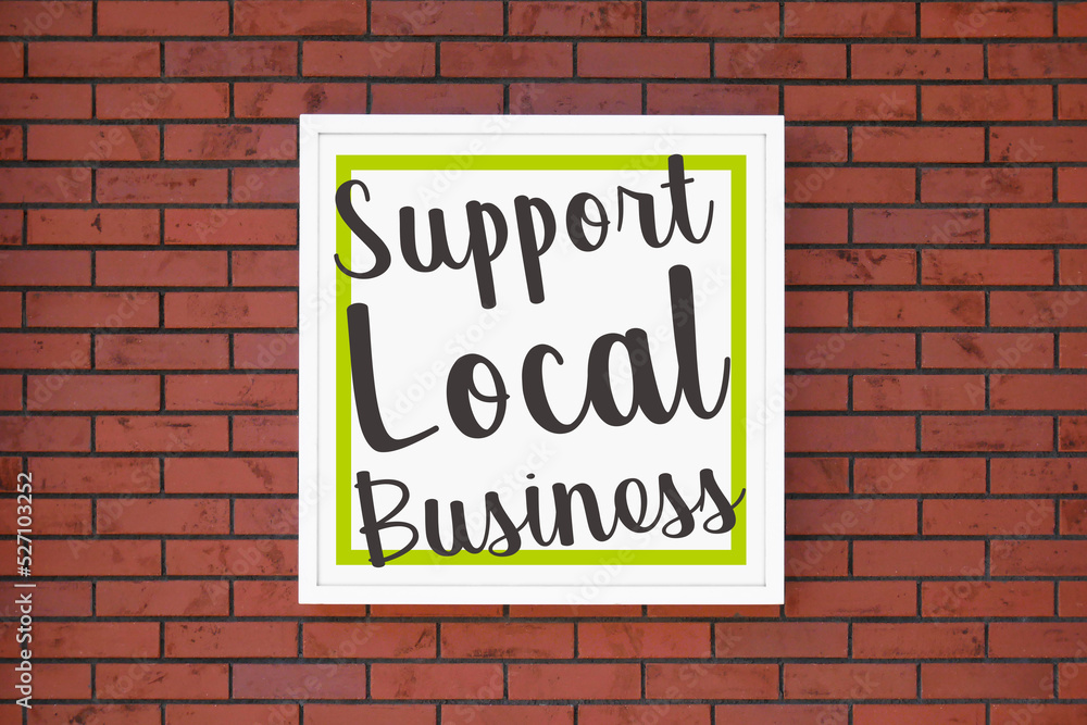 Obraz premium Support Local Business と書かれた正方形の看板