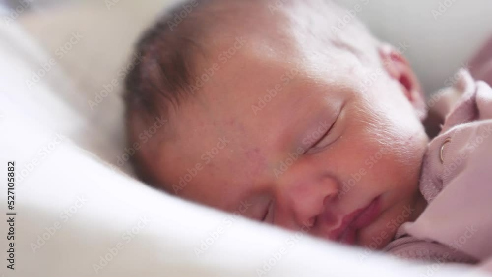 newborn baby sleeping. cute a brunette newborn baby sleeping in bed close up in maternity hospital bedroom. lifestyle happy family kid dream concept. cute newborn baby girl sleeping close up newborn baby sleeping. cute a brunette newborn baby sleeping in bed close up in maternity hospital bedroom. lifestyle happy family kid dream concept. cute newborn baby girl sleeping close up