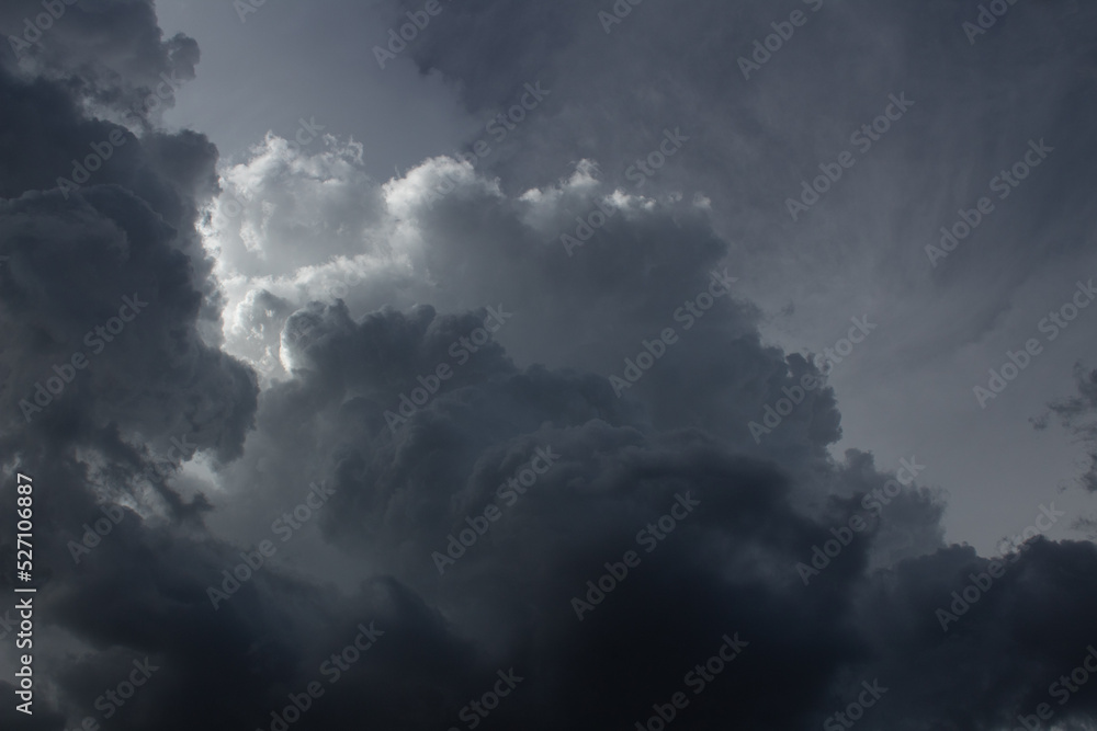 Dramatic dark and moody monsoon clouds in the Sonoran Desert during the month of August, 2022. Beautiful multilayered heavenly cloudscapes. Pima County, Tucson, Arizona, USA.