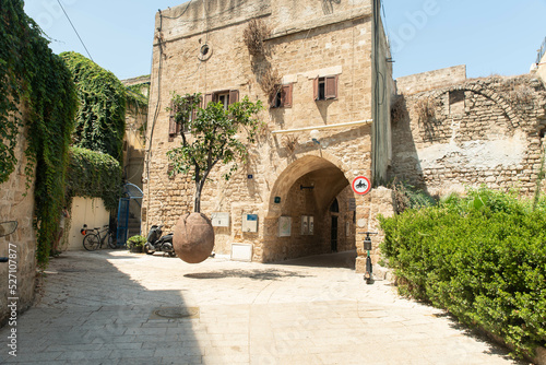 Old Jaffa Tel Aviv, Israel. City view and sight. Famous suspended orange tree. Sightseeing and tourism in Israel, Middle East. photo