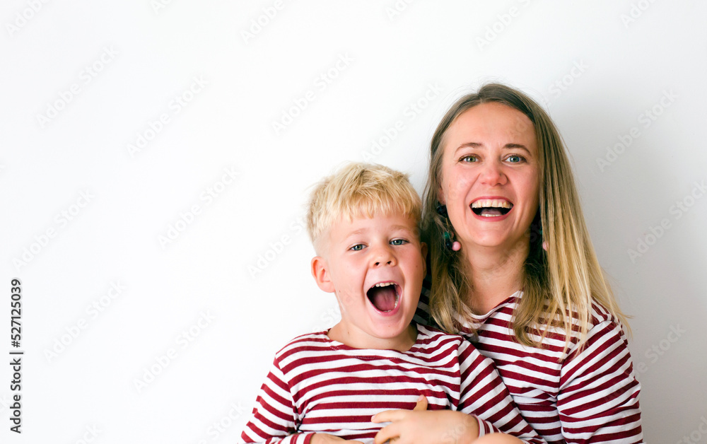 Portrait of happy mother and son over white background , Mother’s Day background Portrait of happy mother and son over white background , Mother’s Day background
