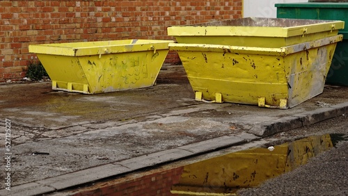 Fotografie, Obraz stacked yellow industrial debris containers
