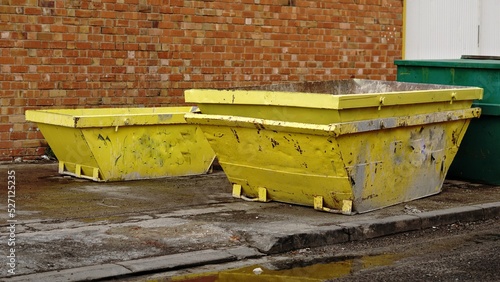 Photos yellow industrial debris containers