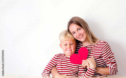 Portrait of happy mother and son over white background , Mother’s Day background