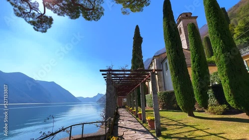 The garden with cypresses on Lake Lugano, Oria, Valsolda, Italy photo