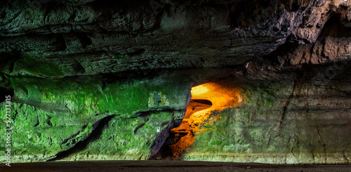 illuminated cave in Romania pestera bolii photo