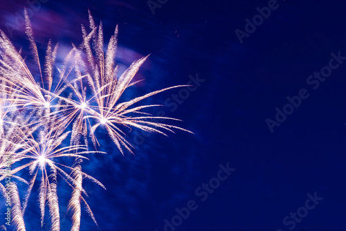 Bright  beautiful blue fireworks in the night sky.