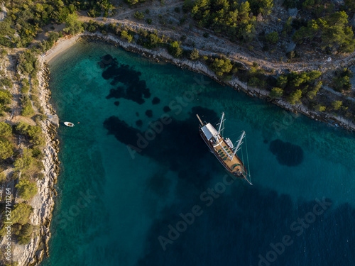 Aerial view of anchored boat © photogoricki