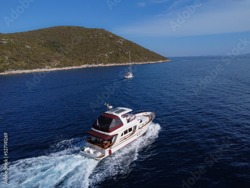 Aerial view of moving boat © photogoricki