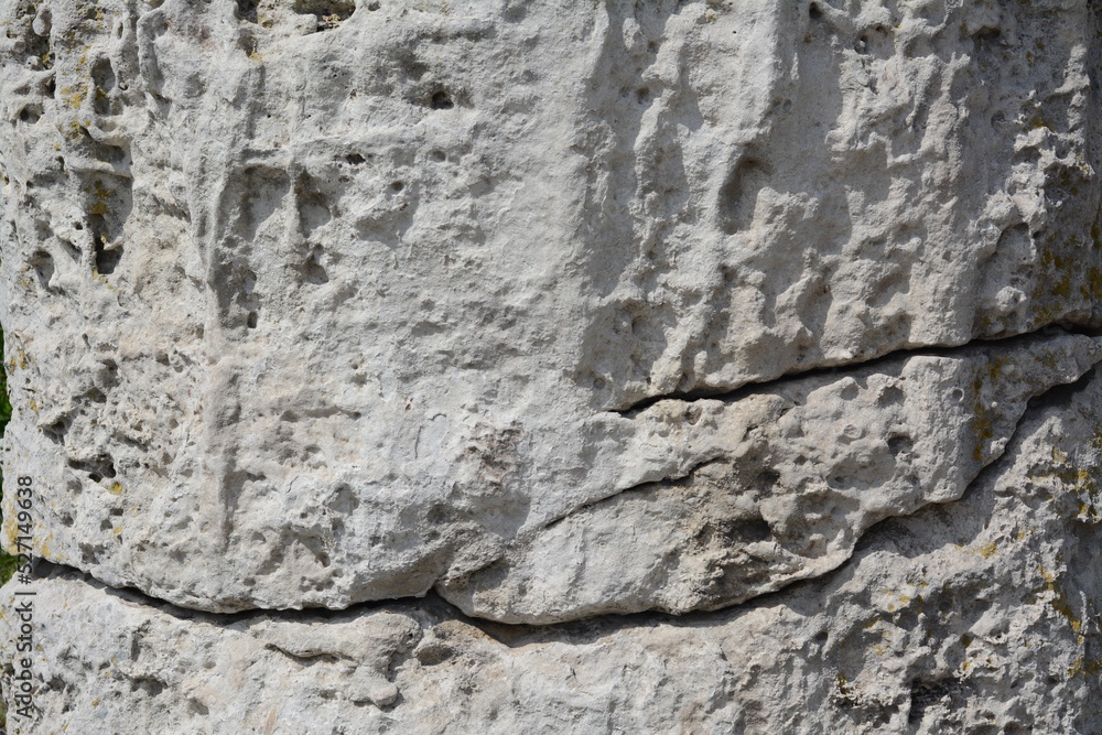 Closeup view of grey stone surface as background Closeup view of grey stone surface as background