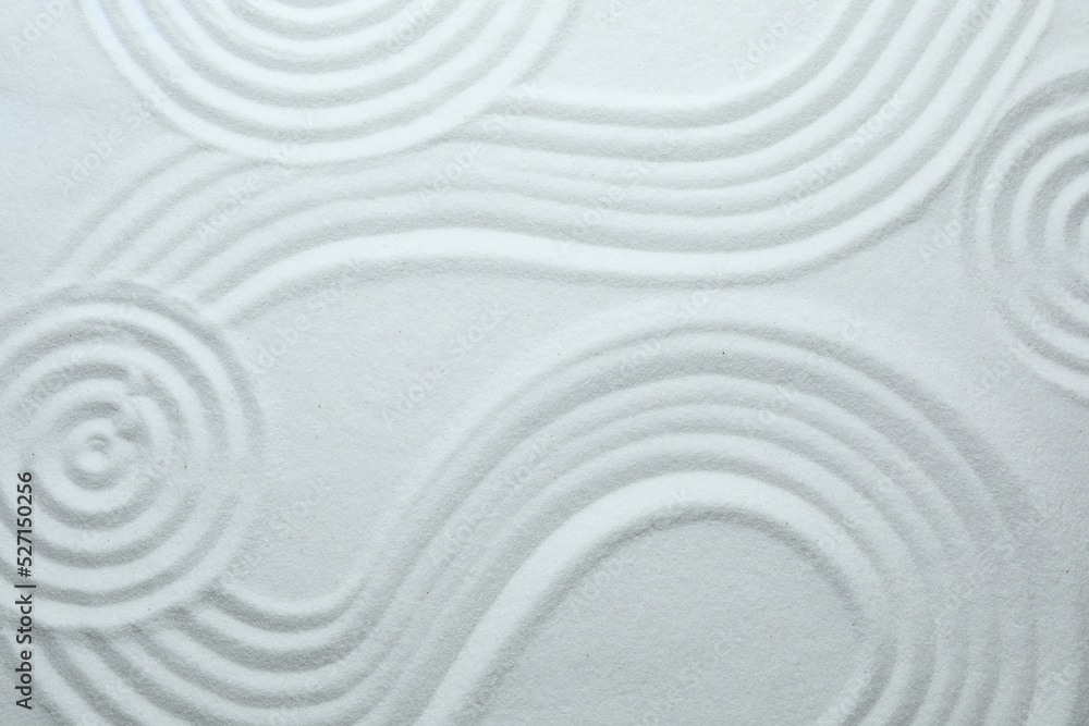 Obraz White sand with pattern as background, top view. Zen, meditation, harmony fototapeta, plakat