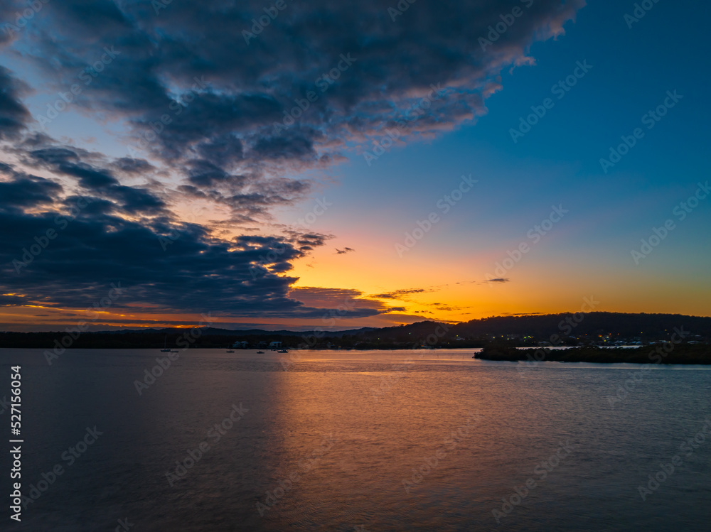 Sunrise over the bay with cloud cover moving in Sunrise over the bay with cloud cover moving in