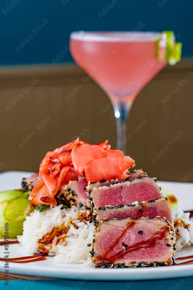 Sesame Crusted Tuna atop Sticky Rice with Baby Bok Choy and Ginger Soy