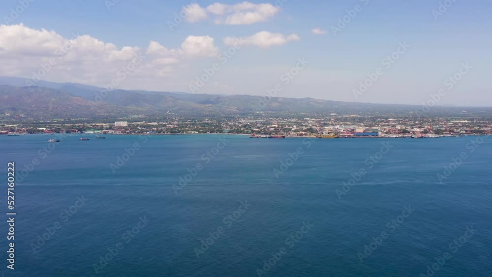 Aerial view of Zamboanga city with its seaport and ships. Commercial and industrial center of the Zamboanga Peninsula Region. Mindanao, Philippines.