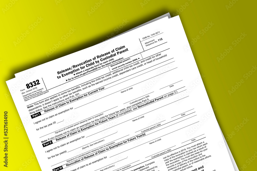 Form 8332 documentation published IRS USA 10.16.2018. American tax document on colored Form 8332 documentation published IRS USA 10.16.2018. American tax document on colored