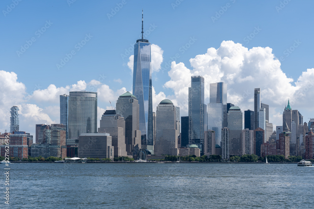 Obraz premium Jersey City, NJ, USA - August 23, 2022: Downtown Manhattan skyline views from Jersey City, NJ, USA, August 23, 2022. Manhattan is the most densely populated of New York City’s 5 boroughs.