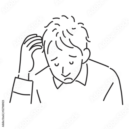 薄毛が気になって落ち込む男性