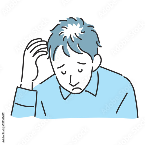 薄毛が気になって落ち込む男性
