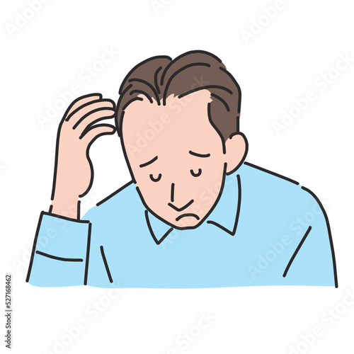 薄毛が気になって落ち込む男性