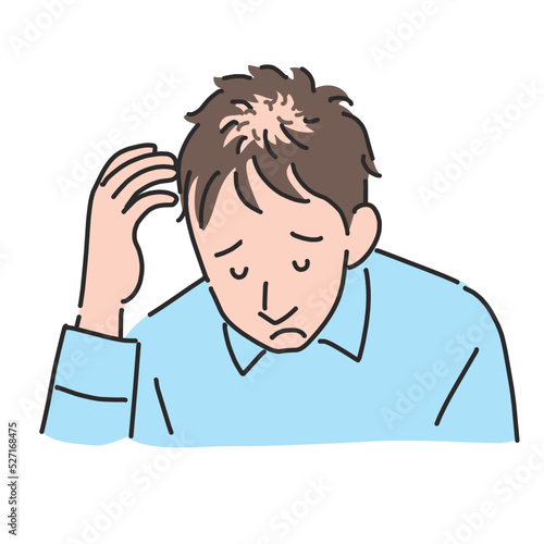 薄毛が気になって落ち込む男性