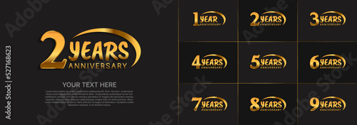 set of anniversary golden color with swoosh for celebration event