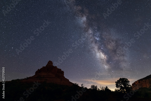 The Milky Way over Bell Rock in Sedona, Arizona photo