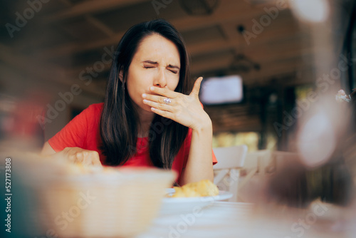 Woman Feeling Sick and Disgusted by Food Course in a Restaurant. Unhappy person having health problems after eating in a diner
