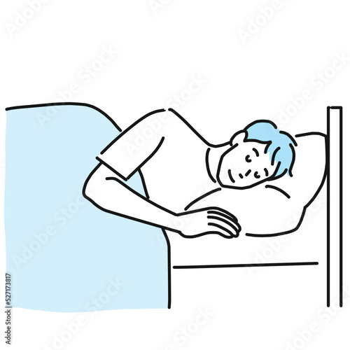 ベッドでぐっすり眠る若い男性