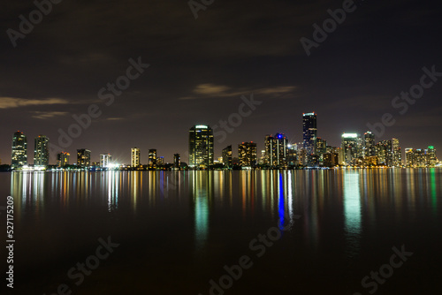 Miami city skyline with reflexions in the sea. State of Florida, USA.