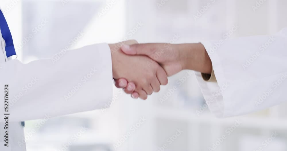 Doctors handshake thank you, promotion or research innovation hands for success with with closeup in hospital. Healthcare employee people or staff shaking hands for collaboration, teamwork or welcome Doctors handshake thank you, promotion or research innovation hands for success with with closeup in hospital. Healthcare employee people or staff shaking hands for collaboration, teamwork or welcome
