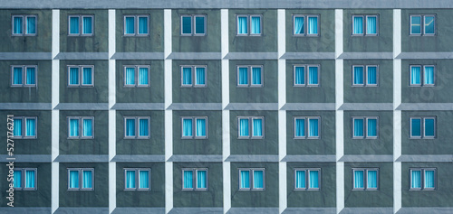 Fotografie Many windows on the facade of the building.