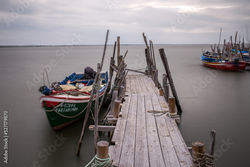 stilt pier of carrasqueira in Portugal. Traditional fishing village. photo