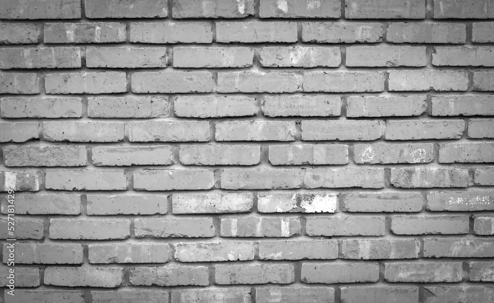Brick wall in black and white. Black and white background. Brick wall in black and white. Black and white background.
