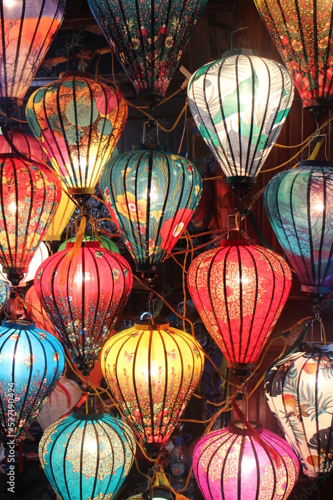 Colorful lanterns in a night market in Asia. Home lanterns decoration from Vietnam. Traditional lights.