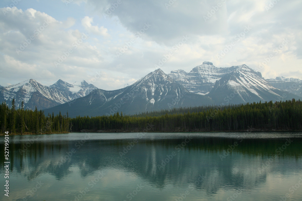 Mountains reflected in a small lake in southern Alberta Canada. Mountains reflected in a small lake in southern Alberta Canada.