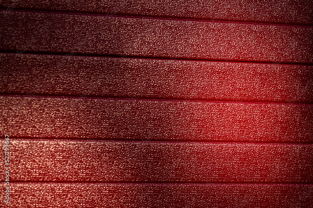 Fototapeta premium Red material, Intense industrial background.