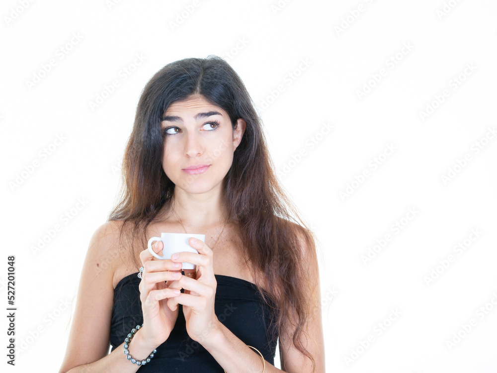 beautiful woman relaxing with eyes side dreaming thinking hold tea cup take break enjoy favorite beverage looks carefree coffee daydreams alone indoor no stress concept beautiful woman relaxing with eyes side dreaming thinking hold tea cup take break enjoy favorite beverage looks carefree coffee daydreams alone indoor no stress concept