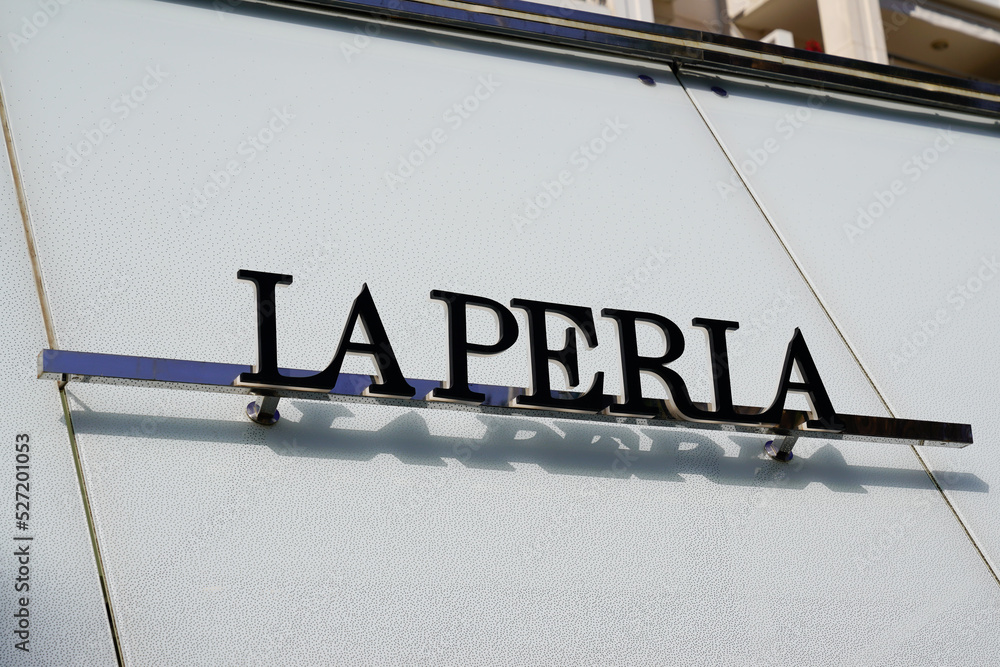 la perla logo sign and brand text on store facade women fashion clothing  shop entrance Photos | Adobe Stock