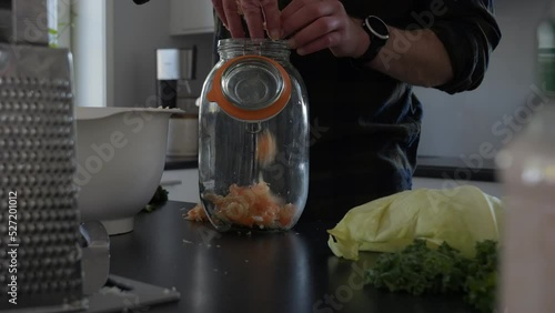 Wallpaper Mural Filling up Glass Jar with Carrot, DIY Vegetable Fermentation Project at Home, Dolly Torontodigital.ca