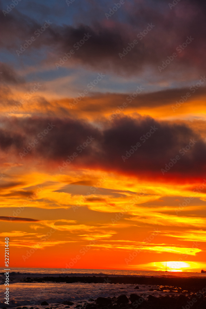 Fototapeta premium Passing winter storm at sunset on the beach in Montecito California