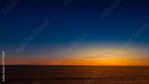 Beautiful twilight sky in ocean. © Johnster Designs