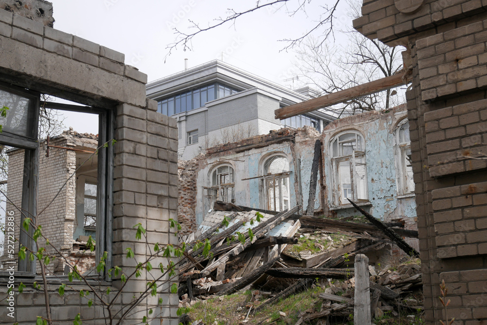 Destroyed Buildings On The Streets Of Ukraine city. Buildings After Being Hit By Missiles. Russia's war against Ukraine.