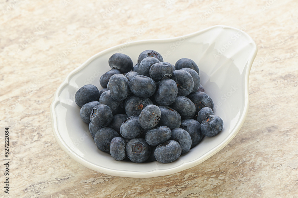 Sweet ripe blueberry heap in the bowl Sweet ripe blueberry heap in the bowl