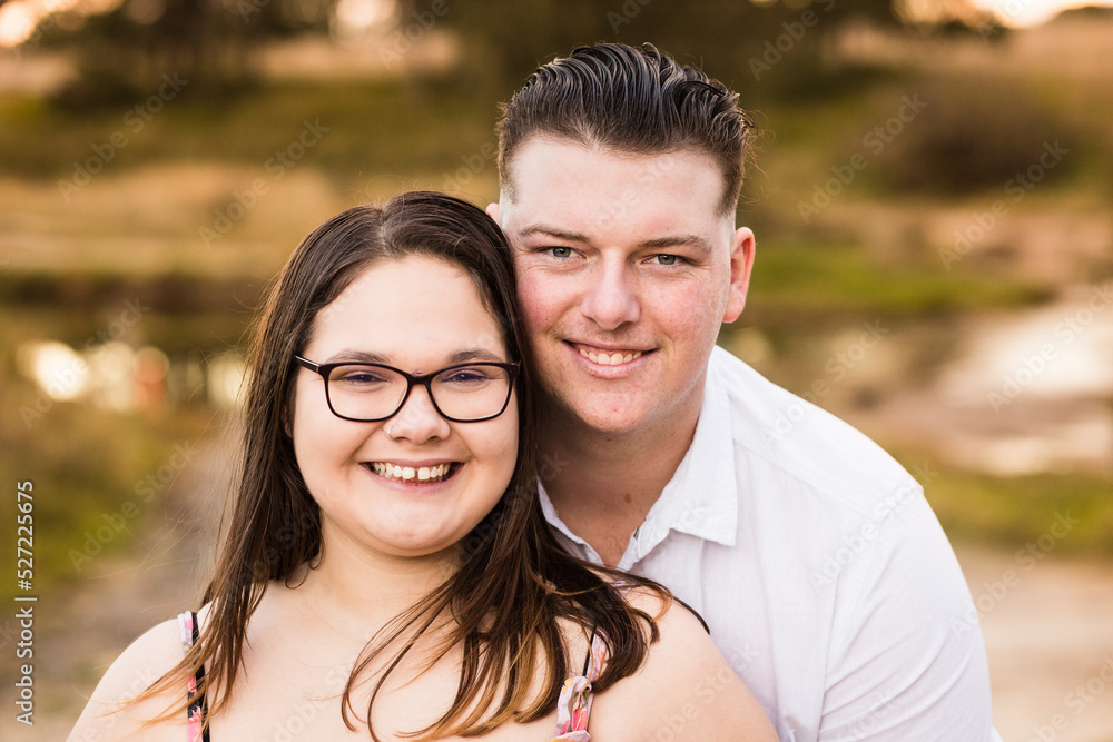 Young couple dating standing together happy smiling Young couple dating standing together happy smiling