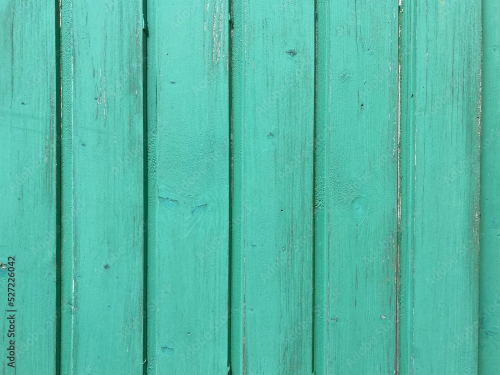 a light green painted washed out plank wall a light green painted washed out plank wall