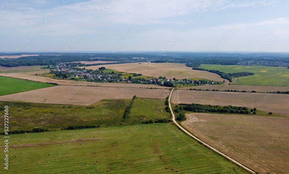 Aerial view of agro rural fields. Harvesting on the farm landscape Aerial view of agro rural fields. Harvesting on the farm landscape
