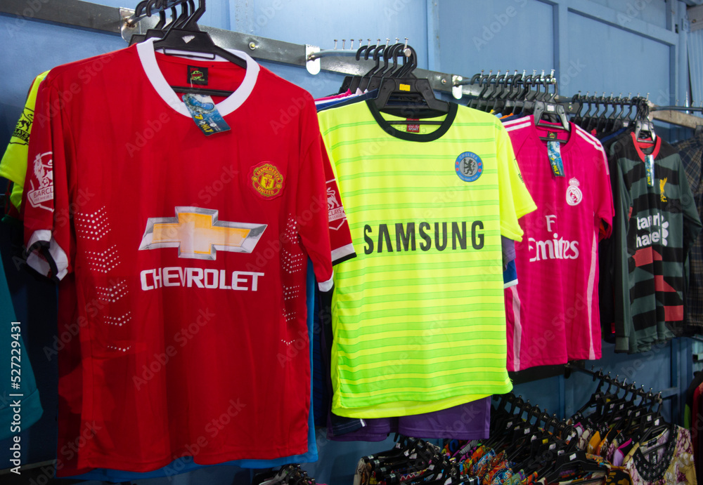 Various fake replica jerseys from famous football clubs being sold